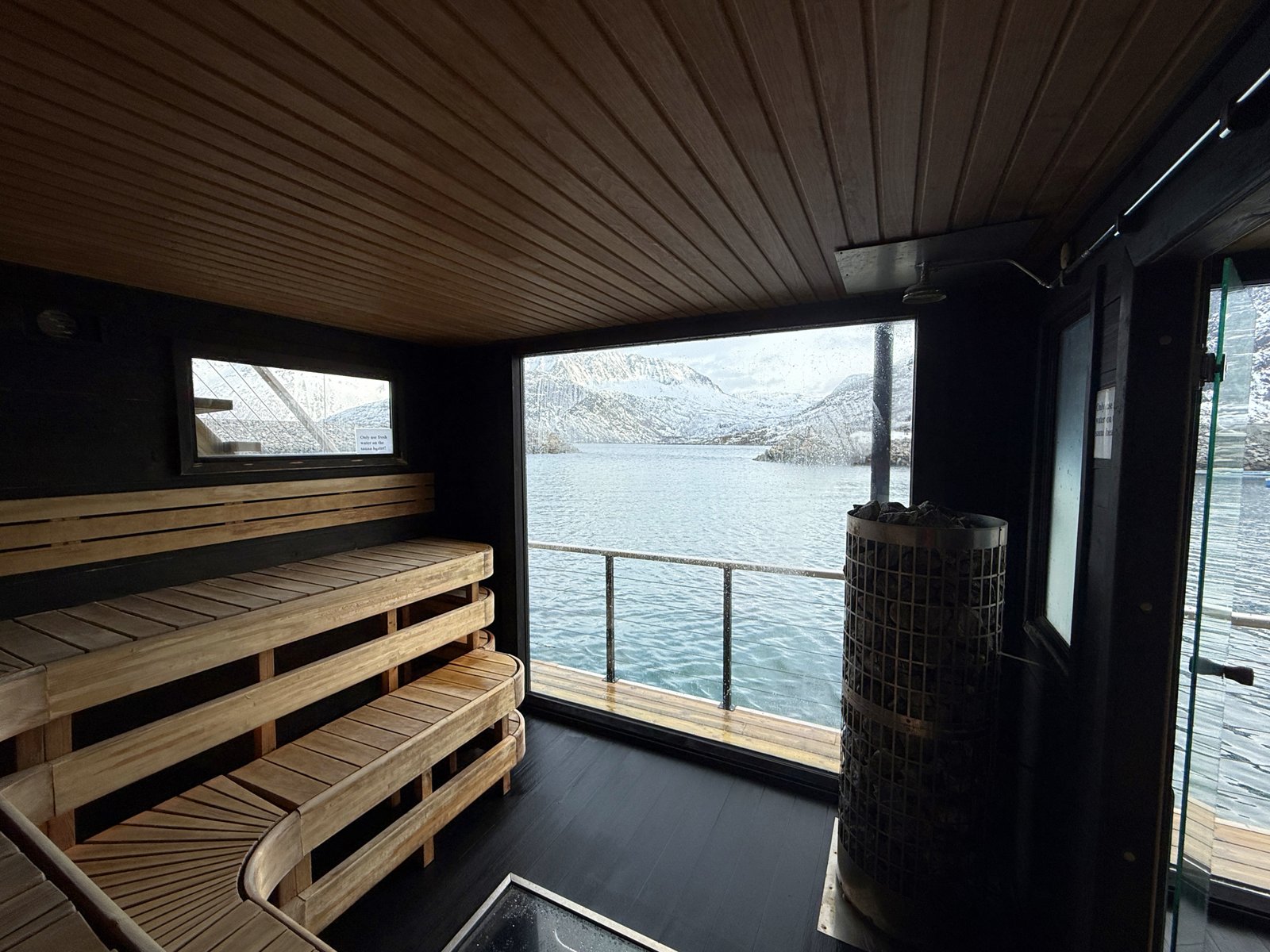 Interior of a sauna overlooking the sea.